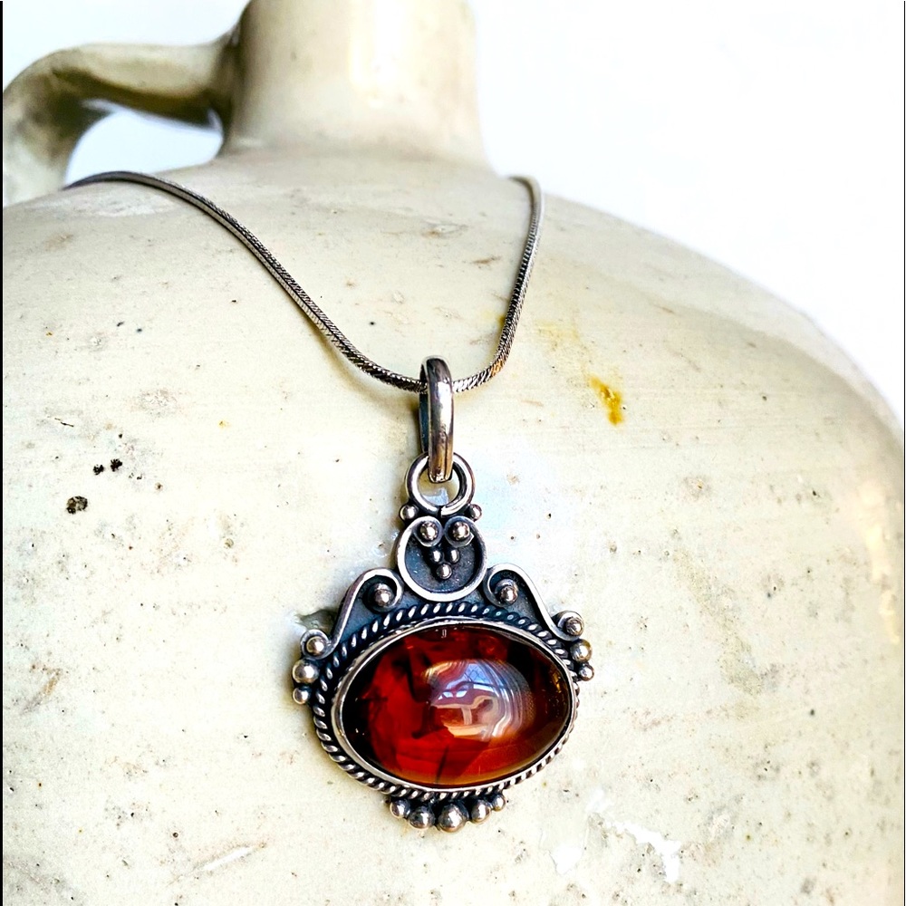 Amber pendant necklace. Single Gorgeous Amber stone set in Sterling Silver.